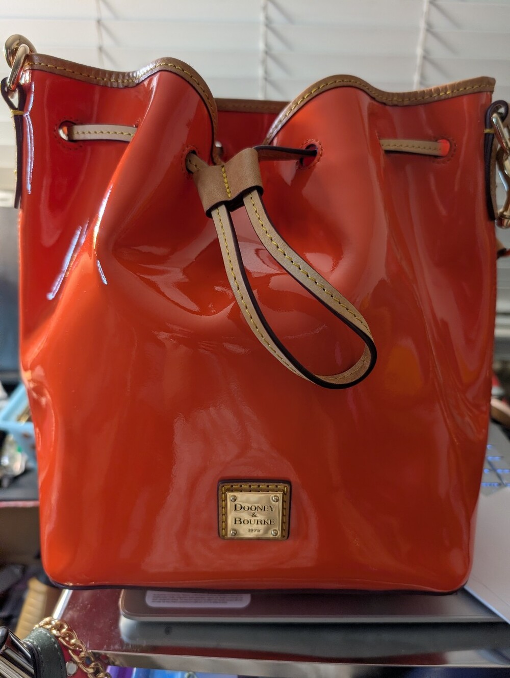 Dooney & Bourke Large Orange Patent Leather Drawstring Bucket Bag  Excellent